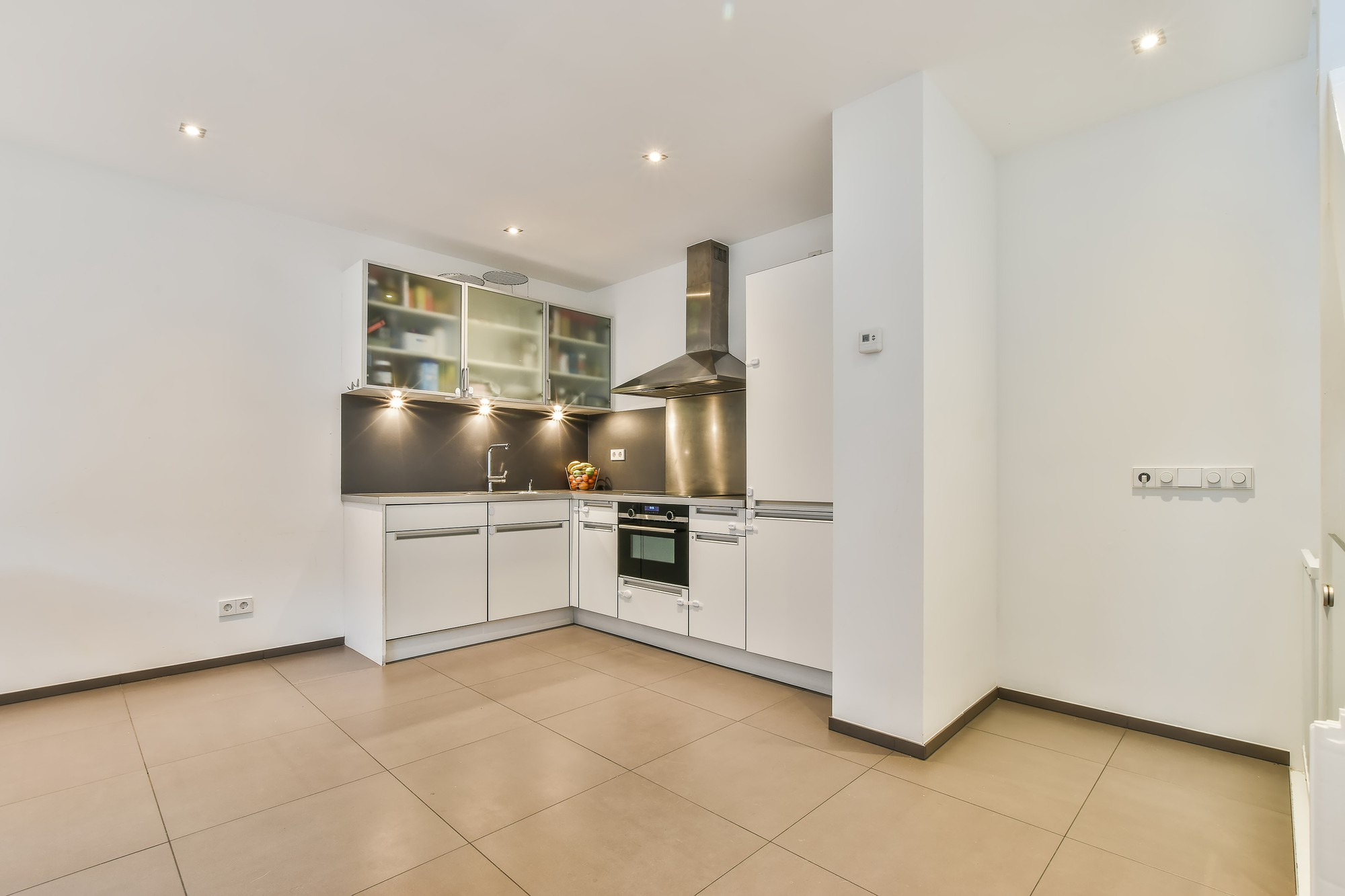 Luxury vinyl plank flooring in Houston TX kitchen by Olafab Cabinetry